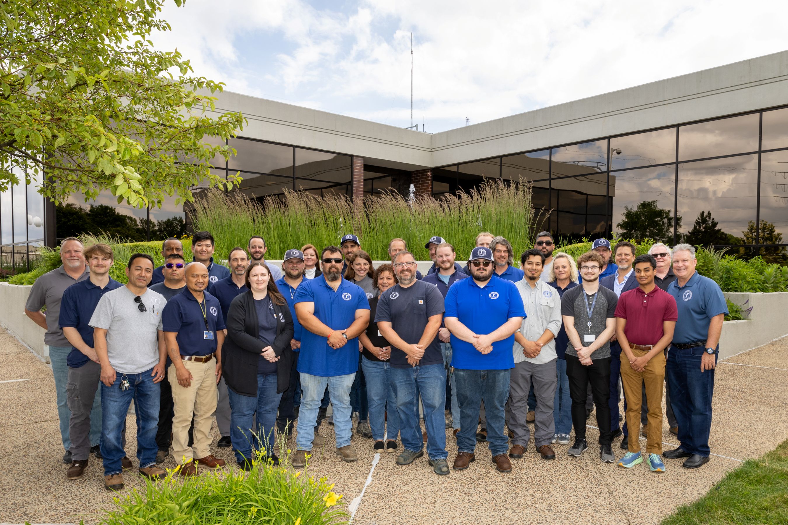 DWC staff in front of main building
